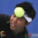 antarafoto-jatim-emas-tenis-putra-140924-aaa-2.jpg